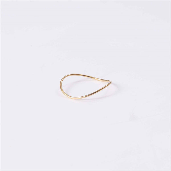 Fine gold ring. 18k gold. Perfect for layering and to accompany other rings. Wave shape and easy fit.