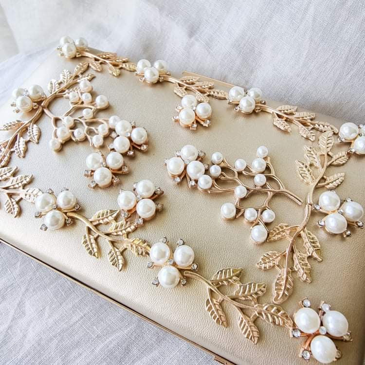 Elegant Pearl embellished evening bag.